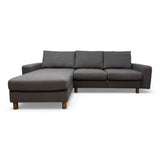 stressless_sofa_i_grå_med_trefarget_ben